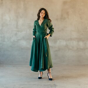 Green linen wrap dress for bridesmaids, midi length, worn with heels