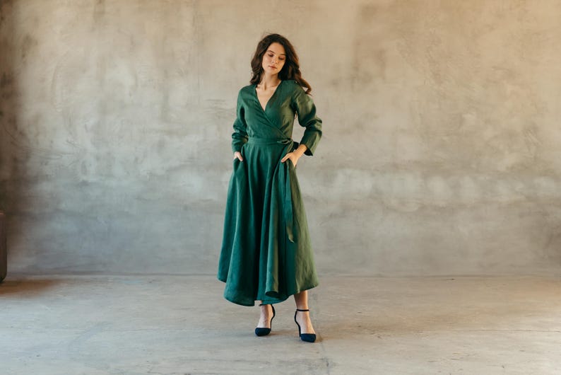 Green linen wrap dress for bridesmaids, midi length, worn with heels