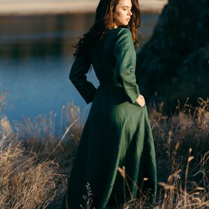 Navy and green linen wrap dress comparison, outdoor autumn setting