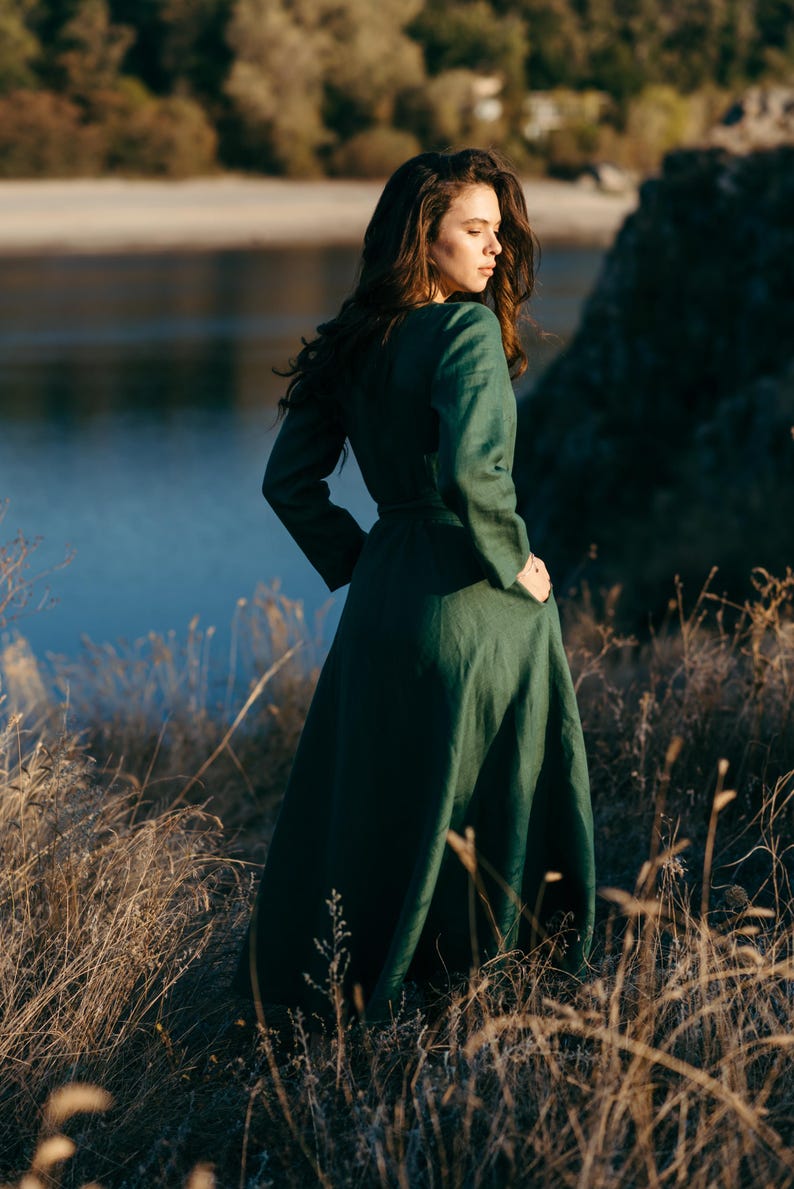 Navy and green linen wrap dress comparison, outdoor autumn setting