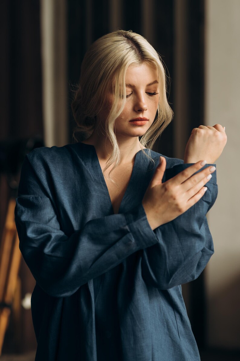 Coastal Blue linen shirt women café lifestyle back view