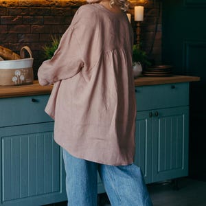 Brown pure linen tunic top dark background detail