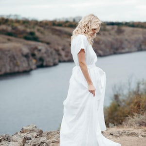 Linen wedding dress, close-up sleeve and neckline detail