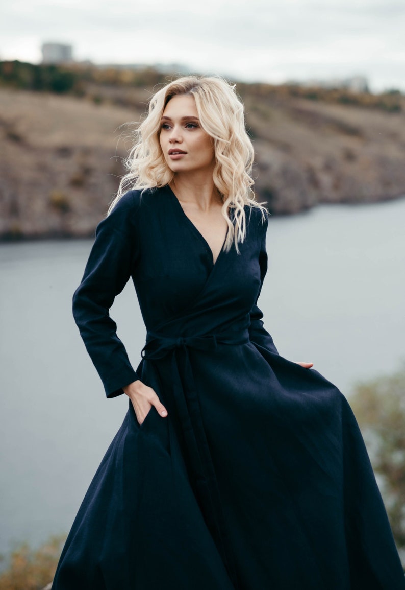 Navy linen wrap dress, close up front view showing wrap neckline