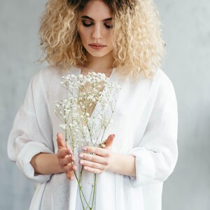 White oversized linen shirt front view full length