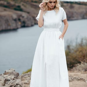 Linen wedding dress, walking shot showing skirt movement