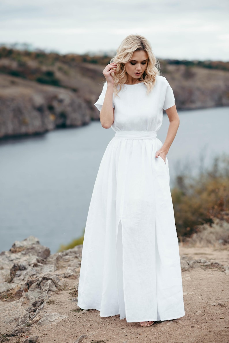 Linen wedding dress, walking shot showing skirt movement