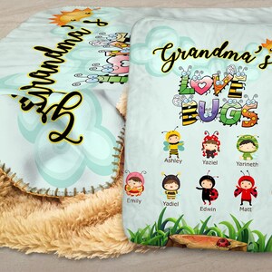 May include: A light blue and white blanket with the text "Grandma's Love Bugs" and a sun with a smiling face. There are eight cartoon bugs with names below them: Ashley, Yaziel, Yarineth, Emily, Yadiel, Edwin, Matt, and Janiel.