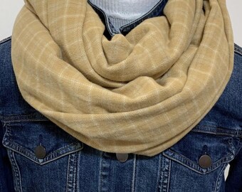 Honey Looks like linen but is  beautiful soft 100% cotton nice thick flannel, easy to wash and wear.. all sizes available