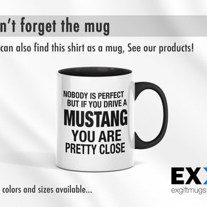 May include: White ceramic mug with a black handle. The mug has black text that reads "Nobody is perfect but if you drive a Mustang you are pretty close".