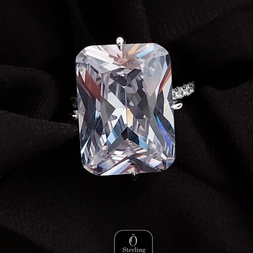 sachin and babi light blue dress Kim Kardashian has had several engagement rings, but the most famous is the  15‑carat cushion‑cut diamond from Kanye West. #KimKardashian  #EngagementRing #diamonds #DiamondHedge #kardashians #jewelry, main image 1