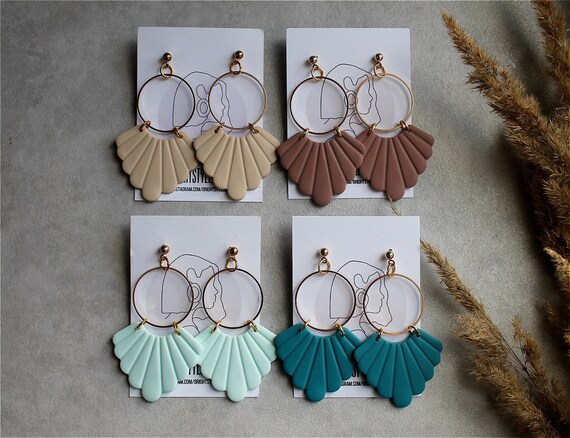 Light blue statement earrings deals