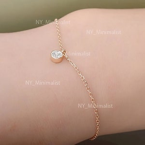 14 kt gouden diamanten solitaire-armband: sierlijke ring, geboortesteen april