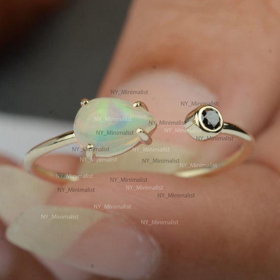 1,800+ Opal Ring Stock Photos, Pictures & Royalty-Free Images - iStock |  Pearl, Opal earring, Jewelry