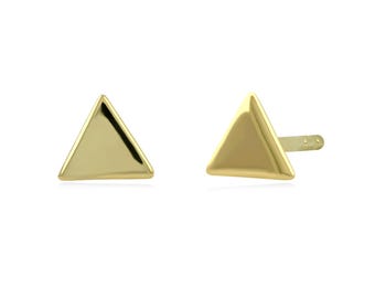 May include: A pair of gold triangle stud earrings with a smooth, polished finish. Each earring features a simple geometric triangular shape with a post backing, showcasing a reflective metallic surface that catches the light evenly across the front.