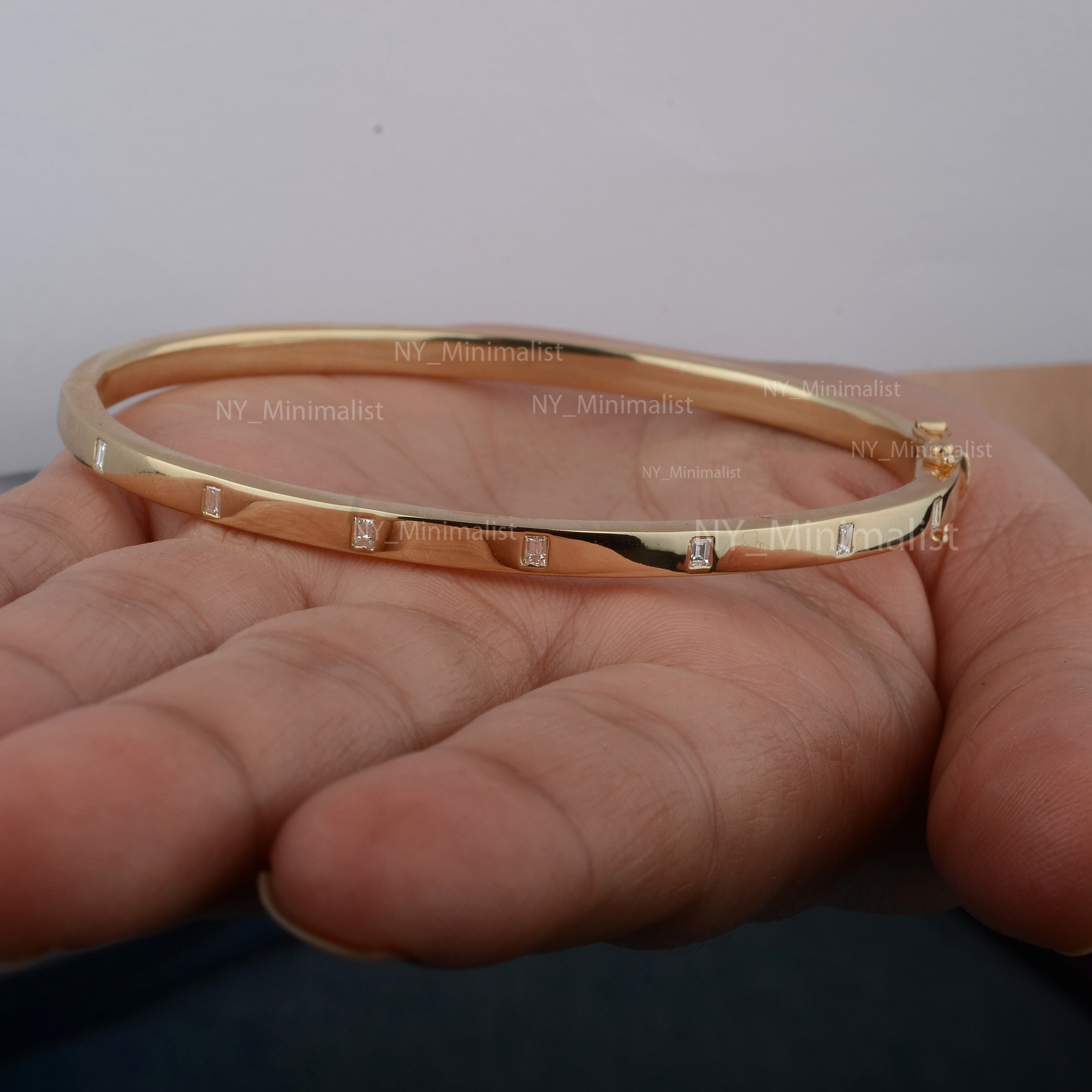 Bracelet en hématite 6mm et motif en acier inoxydable