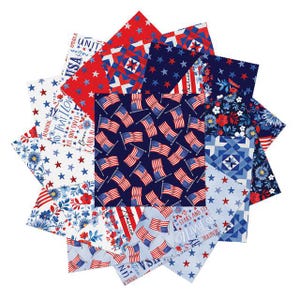 May include: A collection of fabric squares in red, white, and blue, arranged in a circular pattern. The squares feature various patriotic designs, including stars, flags, and floral patterns. Some squares have text that reads "USA" and "Beautiful".