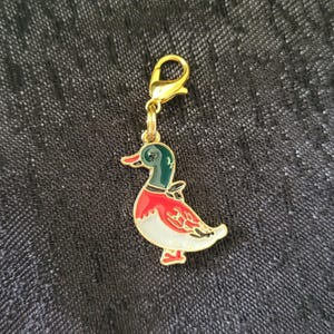 Hermoso dije con cremallera en forma de pato, pato silvestre, clip de langosta, pulsera, bolso, cartera, estuche para lápices, mochila escolar, chaqueta, abrigo, marcador de puntos