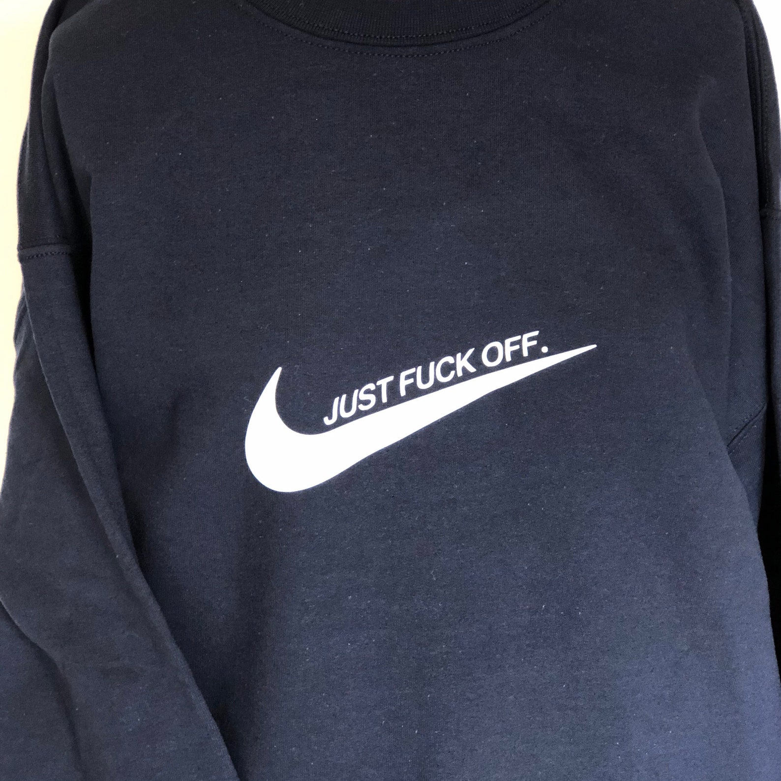 white nike tick jumper