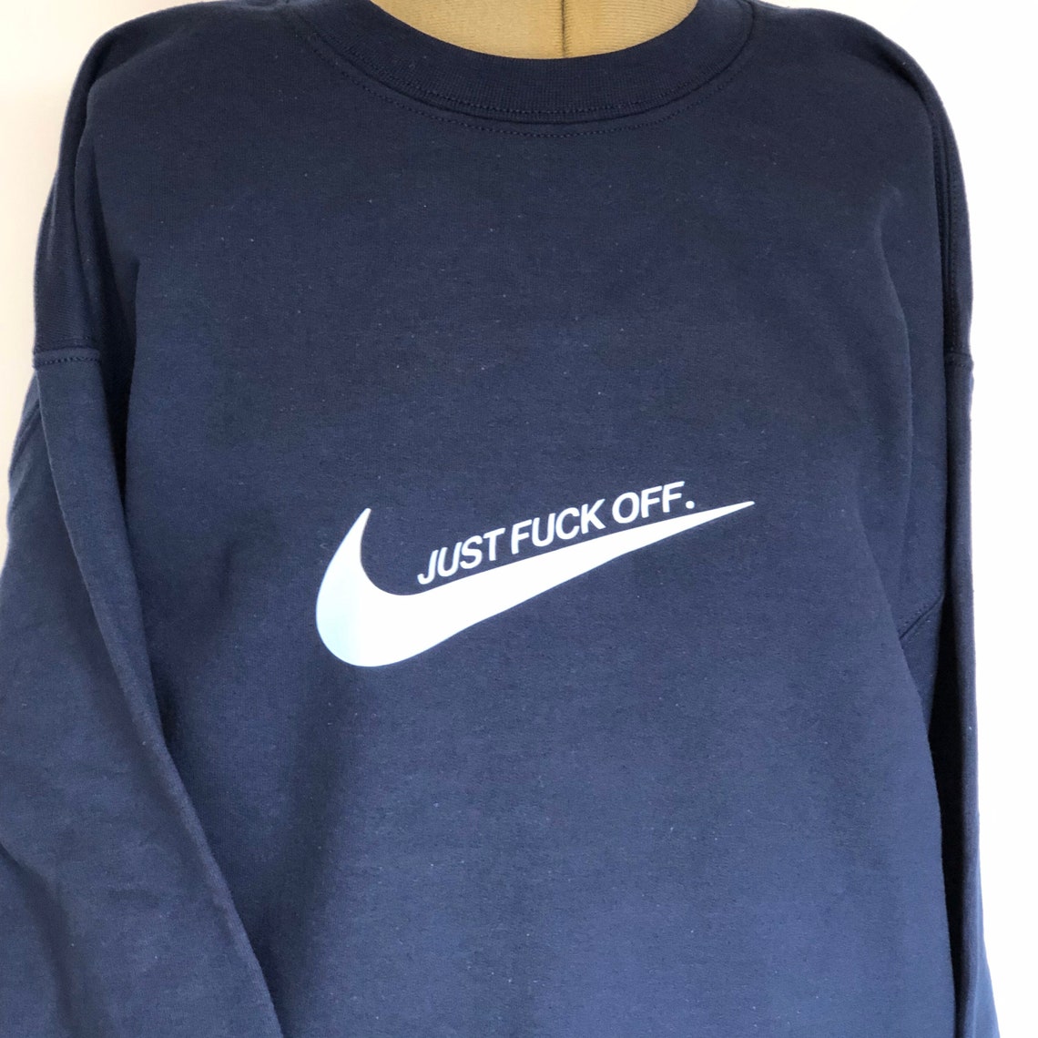 white nike tick jumper