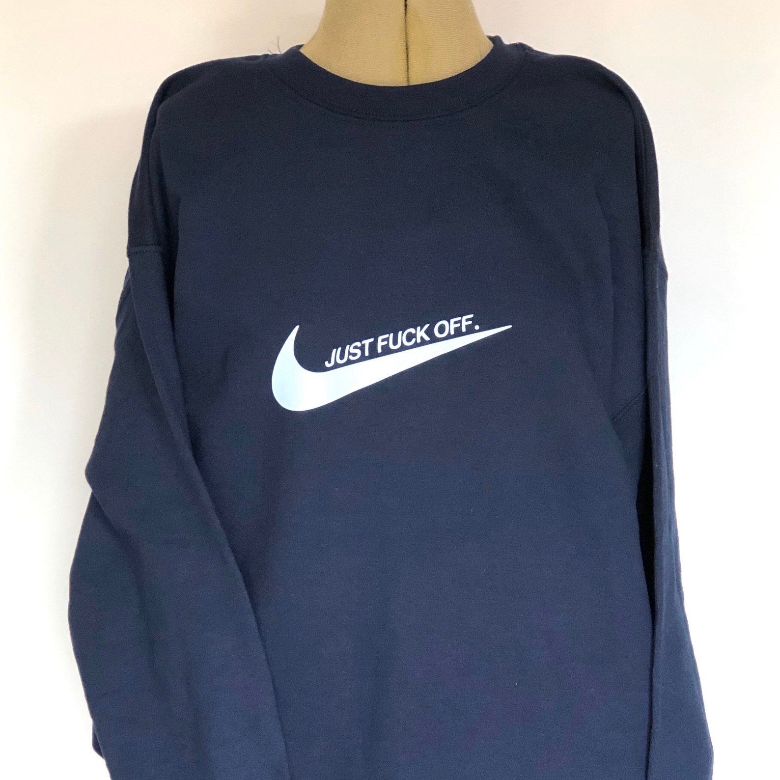 white nike tick jumper