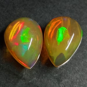 Ethiopian Opal Ethiopian Opal Cabochon Pair Size 10x7 MM Top Beautiful "RED + GREEN" Full On Multi Fire Opal Pair For Jewelry Earring Uses