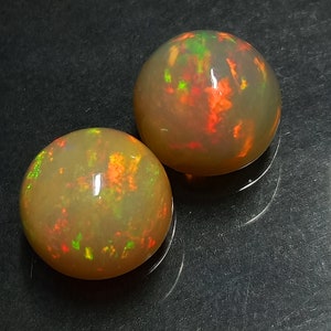 Ethiopian Opal Ethiopian Opal Cabochon Pair Size 9x9 MM Top Attractive "RED + GREEN" Full On Multi Fire Opal Pair For Jewelry Earring Uses