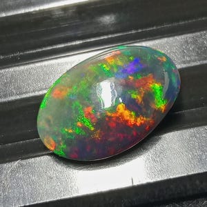 Ethiopian Black Opal Cabochon: Oval Gemstone for Jewelry Making (13x9 MM, 2.50ct