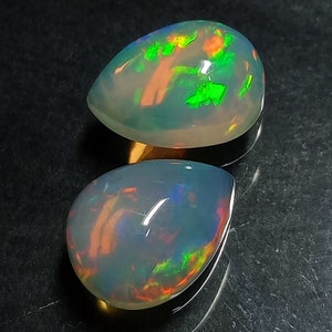 Ethiopian Opal Ethiopian Opal Cabochon Pair Size 10x8 MM Top Gorgeous "RED + GREEN" Full Flashy Wello Fire Opal Pair For Jewelry Earring Use