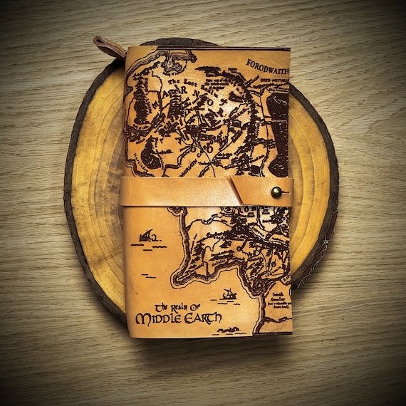 A hand-wrapped leather journal featuring the actual Middle Earth map — niche, nerdy, and visually stunning in a way that no generic journal can replicate.