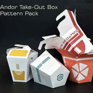 Könnte beinhalten: Eine Sammlung von Take-Out-Boxen aus Papier in verschiedenen Designs und Farben. Die Boxen sind weiß, orange und grün, mit geometrischen und textlichen Mustern. Der Text "Andor Take-Out Box Pattern Pack" ist oben sichtbar.