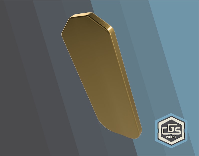Puede incluir: Una placa de metal octogonal de color dorado. La placa es lisa y tiene un borde ligeramente redondeado.