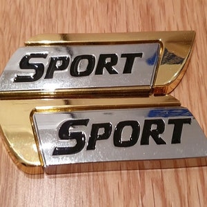 Pair Quality 3D METAL SPORT Logo Car Sticker Rear Trunk Emblem Badge Decal - Gold Colour