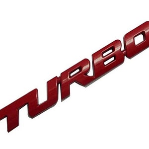 May include: Red plastic "TURBO" emblem.
