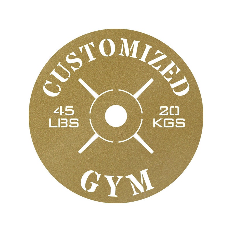 May include: Gold-colored weight plate with the text "CUSTOMIZED GYM" and the weight "45 LBS" and "20 KGS" printed on it.