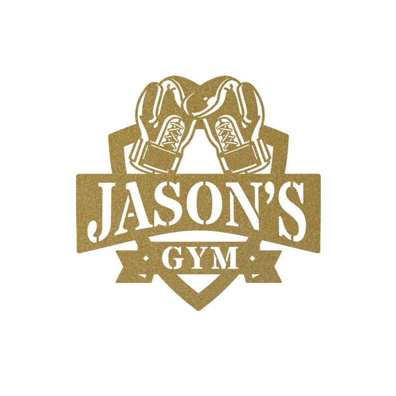 May include: Gold-colored metal sign with a heart shape and boxing gloves. The sign reads "Jason's Gym".