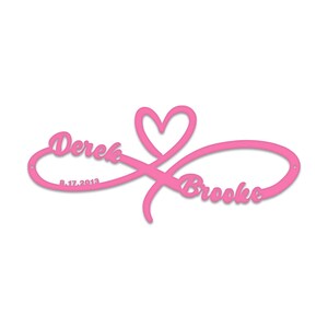 May include: Pink infinity symbol with a heart in the centre. The names "Derek" and "Brooke" are written on either side of the symbol, with the date "8.17.2013" below "Derek".