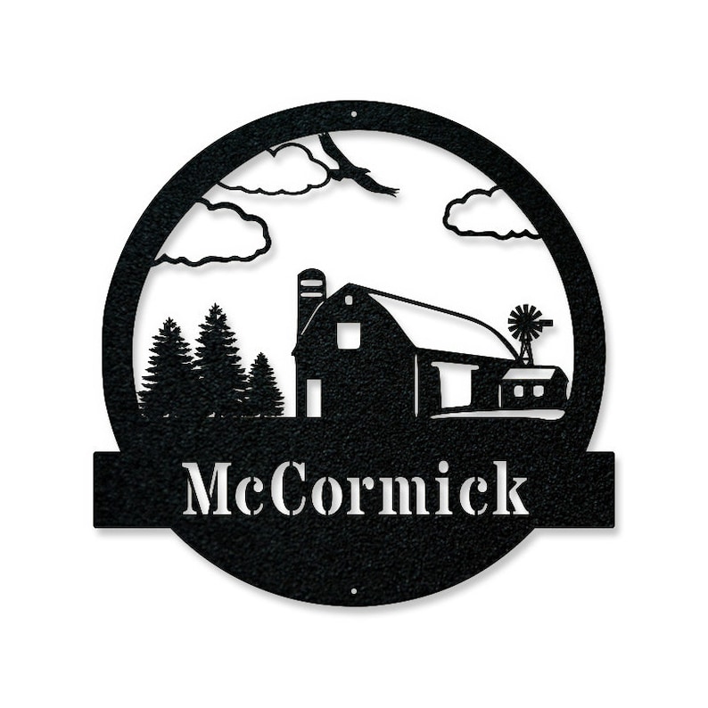 May include: Black metal sign with a silhouette of a barn, trees, clouds, and a bird. The sign has a white banner with the name "McCormick" on it.