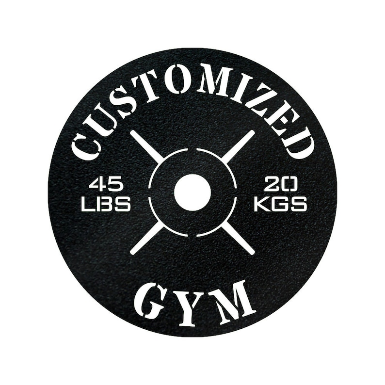 May include: Black weight plate with white text that reads "CUSTOMIZED GYM" and "45 LBS 20 KGS".