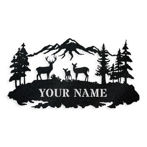 May include: Black metal silhouette of a mountain range with three deer, two trees on each side, and the text "YOUR NAME" at the bottom.