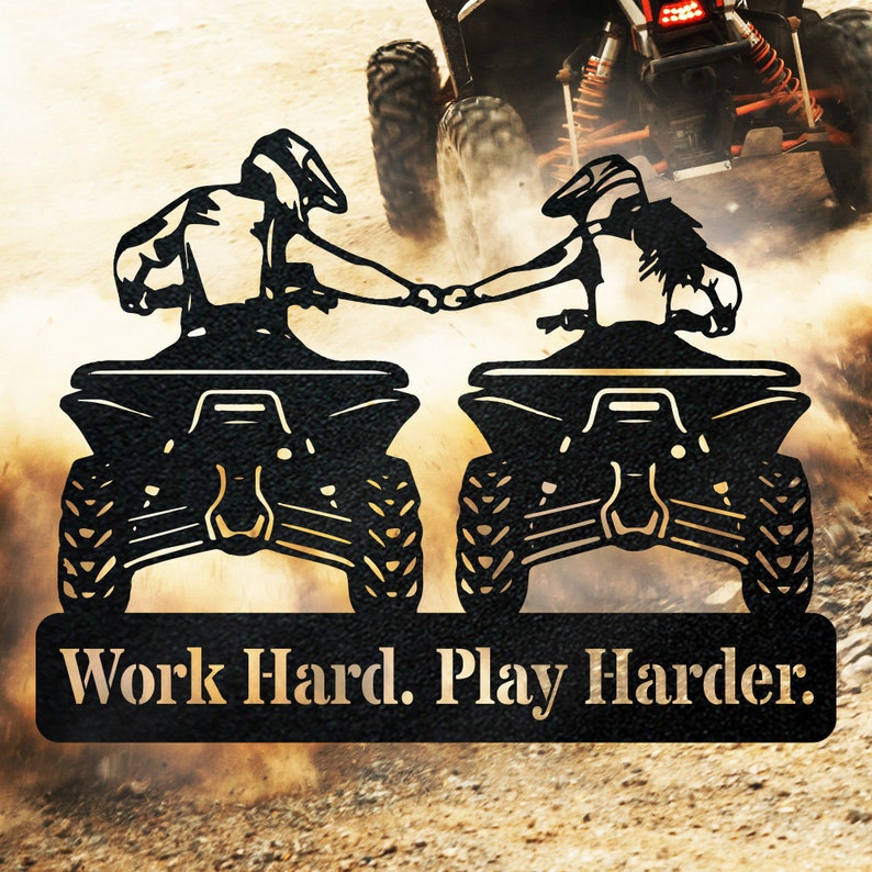 May include: Black silhouette of two people riding quad bikes, holding hands, with the text "Work Hard. Play Harder." below.