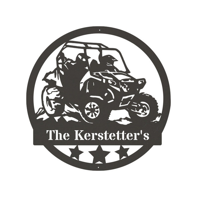 May include: Black and white silhouette of a side-by-side ATV with two riders in a circle with five stars and the text "The Kerstetter's" below.