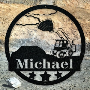 May include: Black metal sign with a silhouette of a skid steer loader scooping up dirt. The sign has the name "Michael" and three stars below the image.