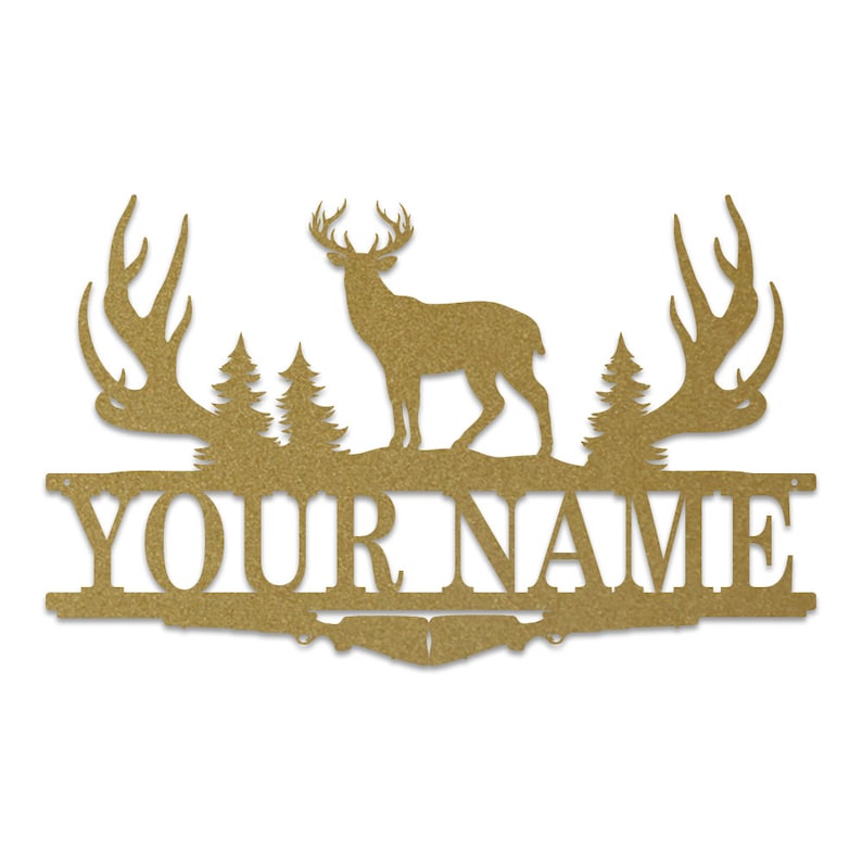 May include: Gold metal deer silhouette with antlers, two pine trees, and the text "YOUR NAME" on a gold metal background.