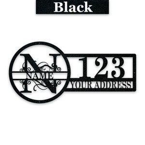 May include: Black metal house number sign with a circle containing a decorative letter N and the word "NAME" and a rectangular section with the number "123" and the text "YOUR ADDRESS".