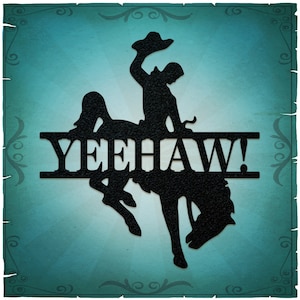 May include: Black silhouette of a cowboy riding a bucking bronco with the word "YEEHAW!" in a banner below.