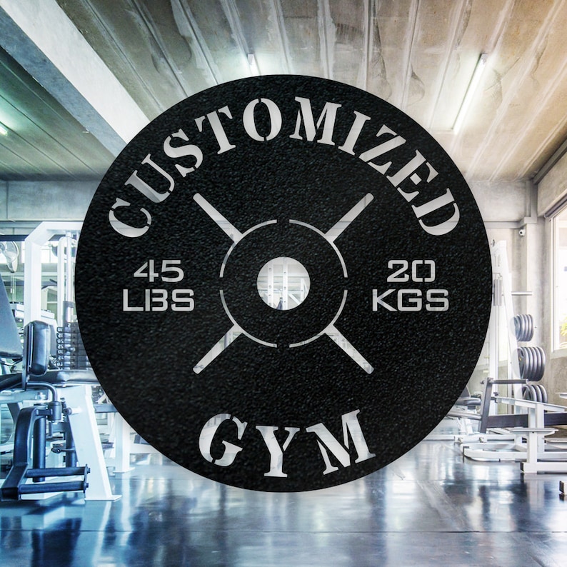 May include: Black and white gym weight plate with the text "CUSTOMIZED GYM" and the weight measurements "45 LBS" and "20 KGS".