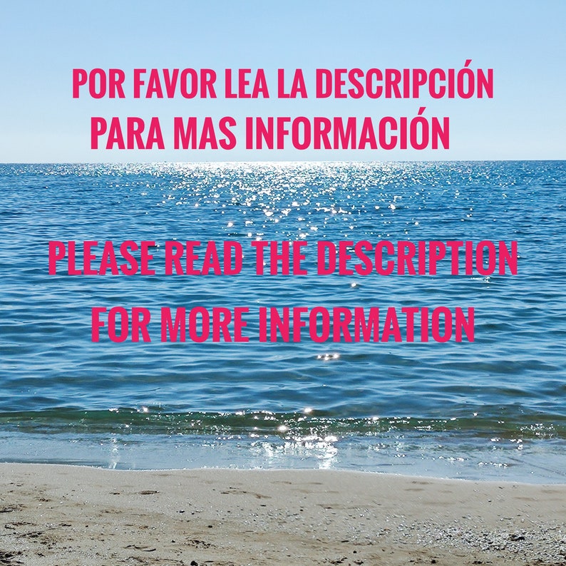 A view of the beach with the sea and sky in the background. The image contains text in English and Spanish that says "Please read the description for more information.