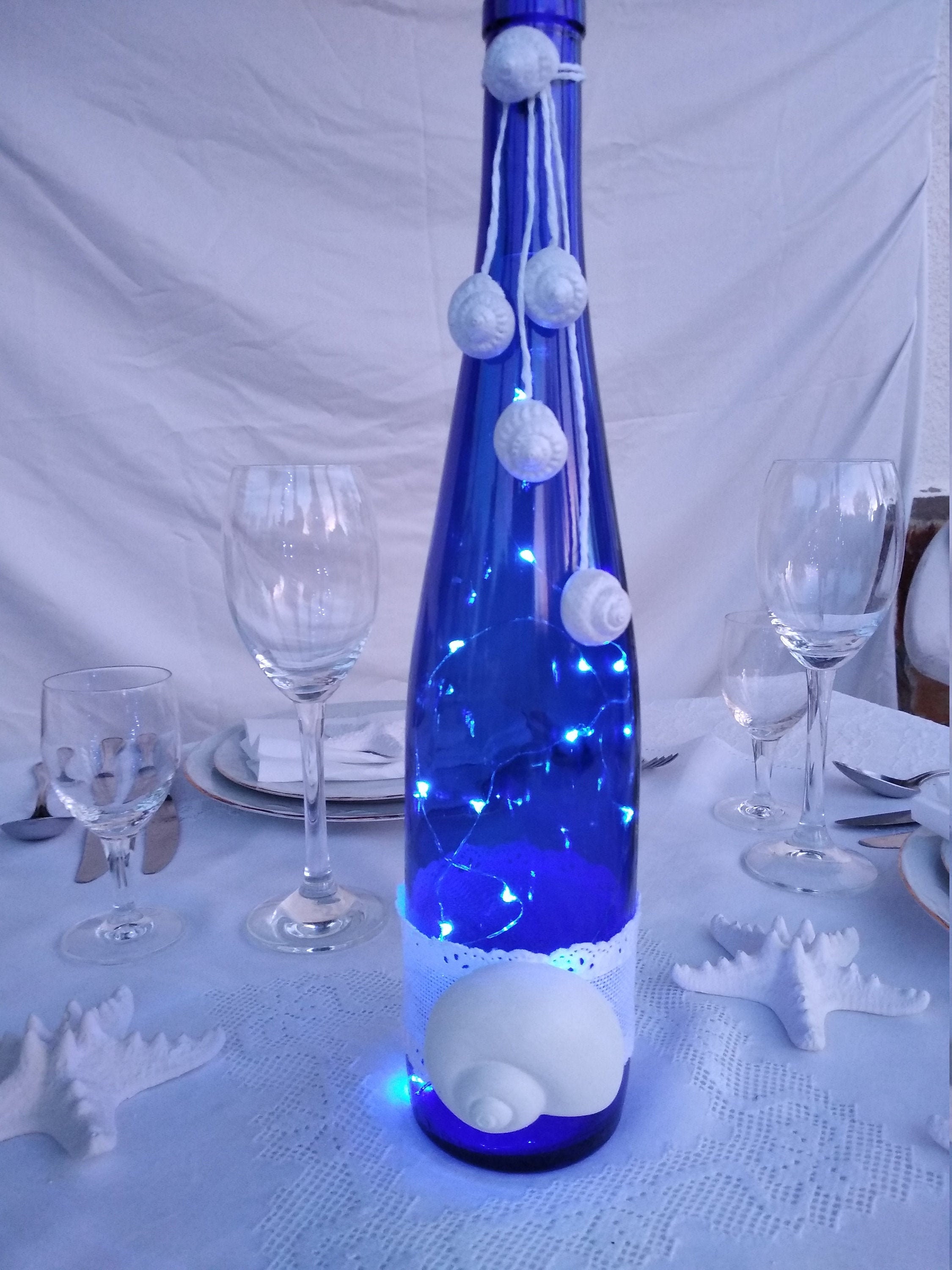 Blue Sea Glass Bottle*Starfish Bottle*Hand Painted*Coastal Decor*Beach House*Blue Sea Glass*Seashells*Ocean in a Bottle*Coastal Home Decor Blue Sea Glass Bottle*Starfish Bottle*Hand Painted*Coastal Decor*Beach House*Blue Sea Glass*Seashells*Ocean in a Bottle*Coastal Home Decor