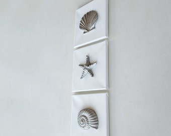 Set of 3 white decorative canvases with shells, light gray and silver tone embossed wall art, beach house seaside decor